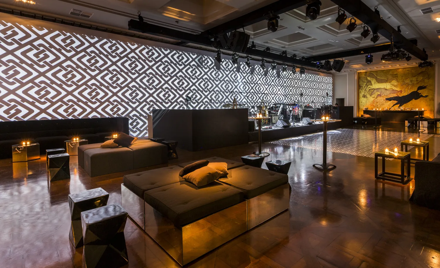 Geometric projection ballroom with mirrored lounge